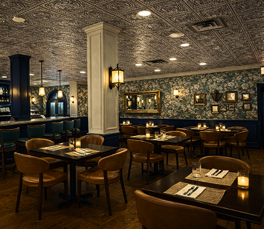 Main dining room inside Porter restaurant in Ambler PA with elegant table setup